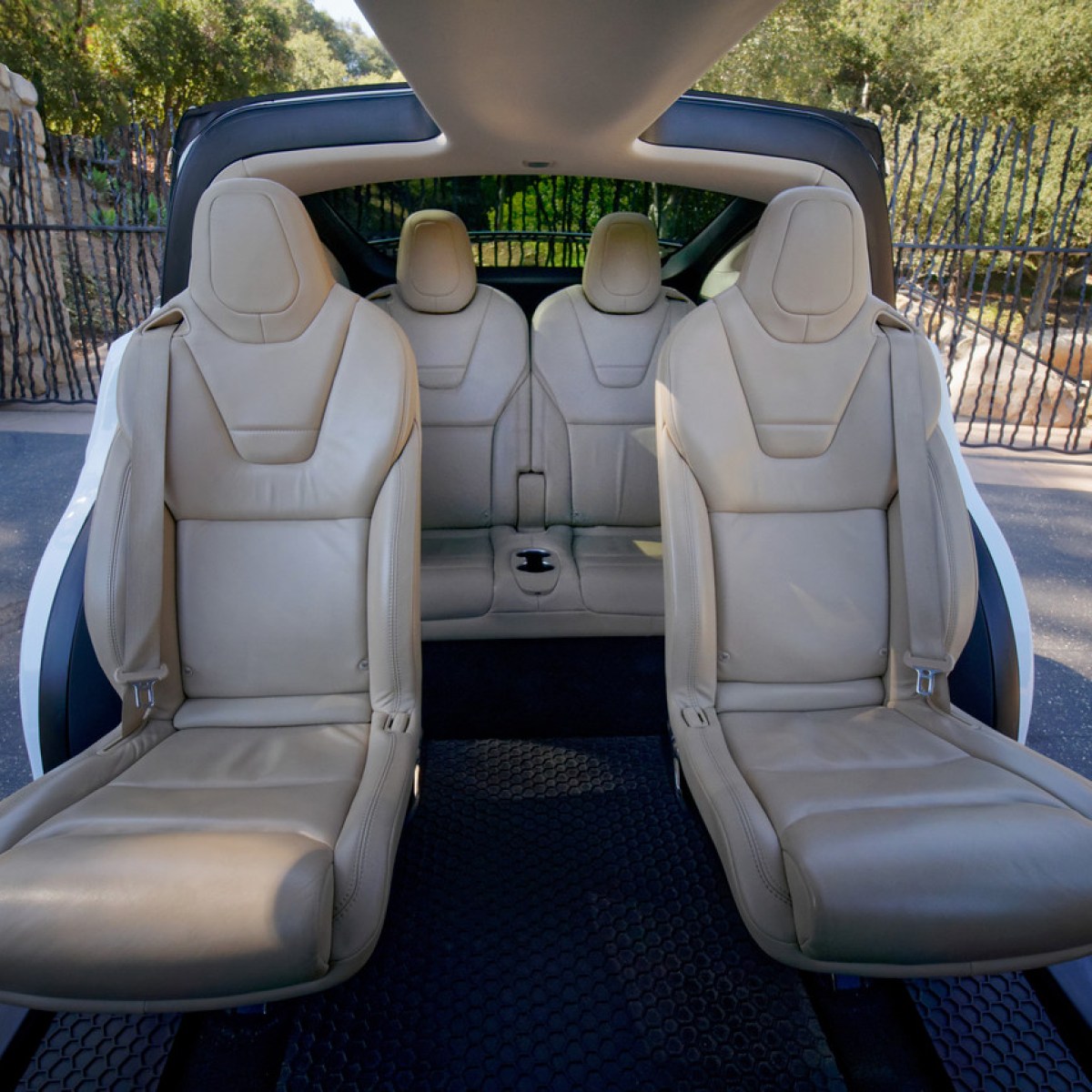 a person sitting in a parking lot