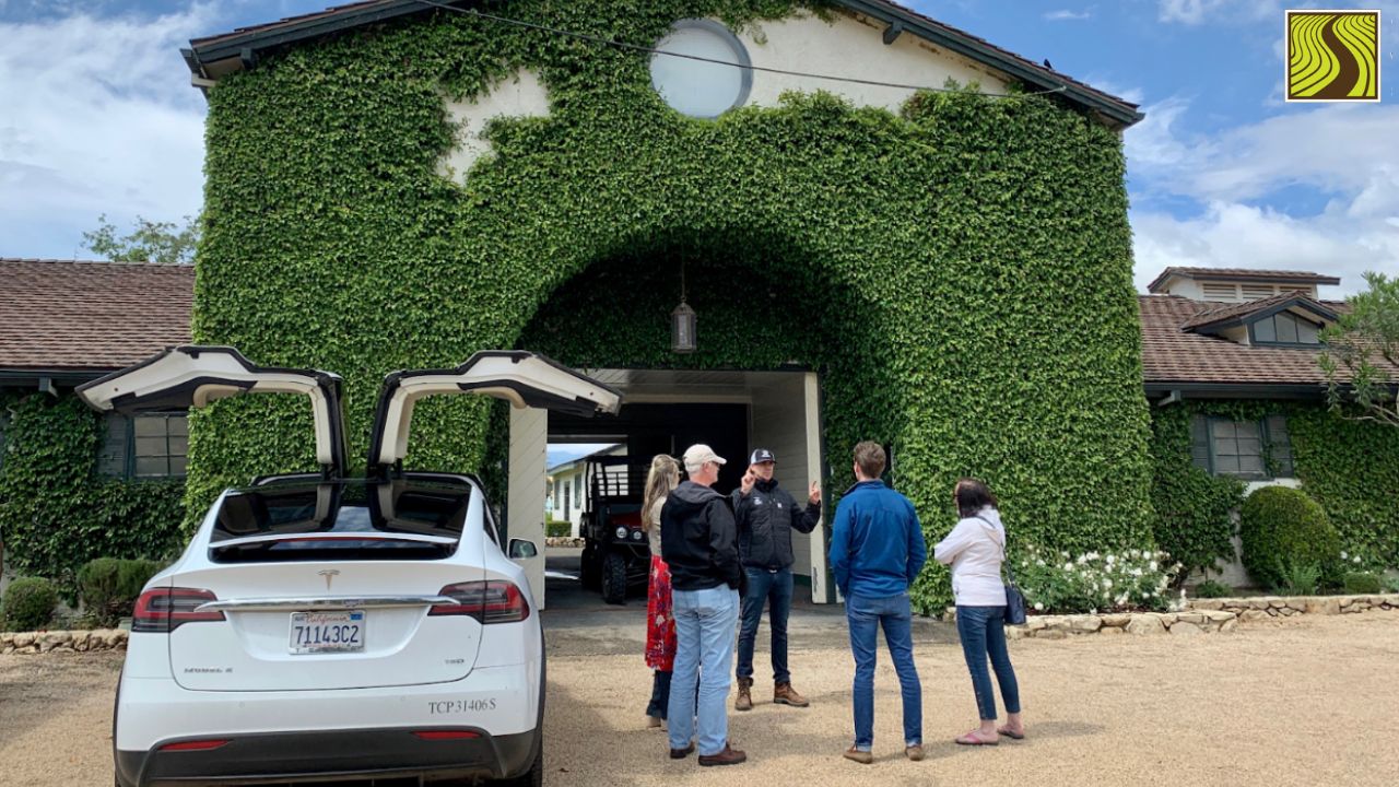 a group of people standing in front of a building