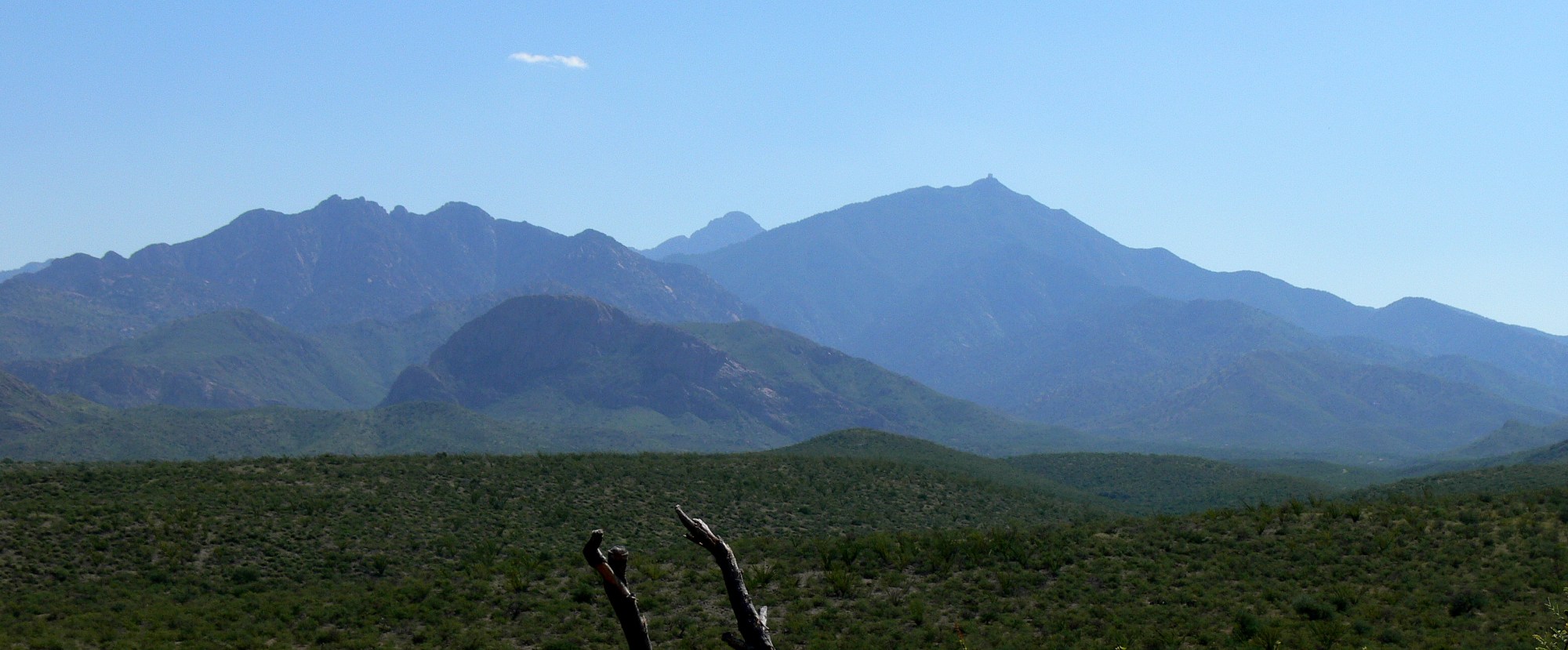 Sta. Rita Hills mountains with green valley vegetation below.