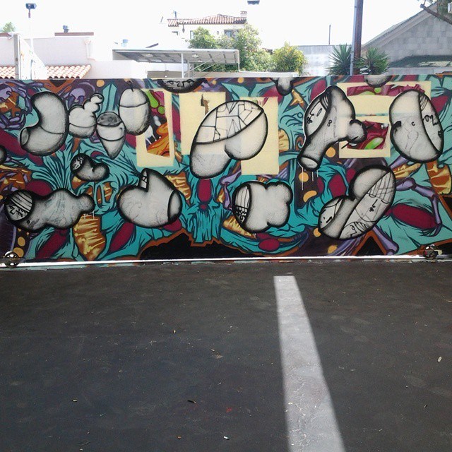 Colorful Bubbleguts mural brightening Santa Barbara Funk Zone wall​‌